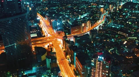 Aerial view time-lapse of a highway intersection in Tokyo Stock Footage 67613249