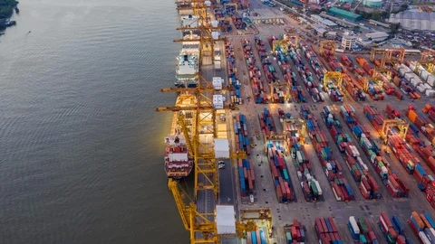 Aerial view time lapse, hyper lapse over industrial import export port at night Stock Footage 109145689