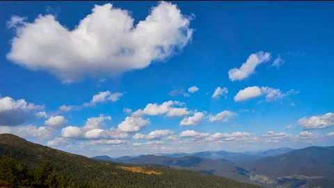 Aerial view time lapse of mountain clouds Stock Footage 134857410