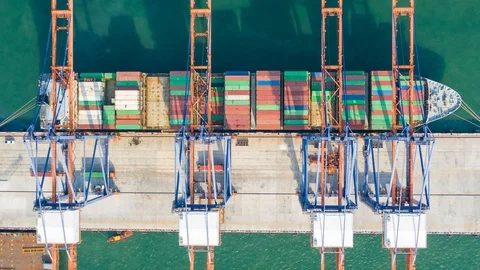 Aerial view. Time laspe. top view container ship in pier with crane bridge carri Stock Footage 105723957