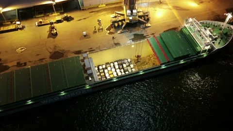 Aerial View Timelapse of Cargo Ship Unloading Stock Footage 146824785