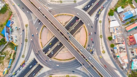 Aerial view timelapse of city circular junction cross road with car movement Stock Footage 113514856