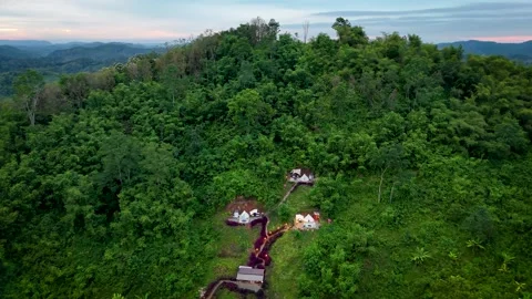 Aerial View of Tiny Glamping Tent Hidden in Dense Tropical  Rainforest Meratus 库存影片 335801245