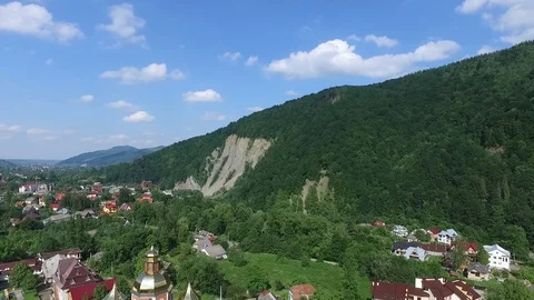 Aerial view of tiny town in the mountains Stock Footage 114180783