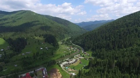 Aerial view of tiny Ukrainian town in the mountains Stock Footage 116024719