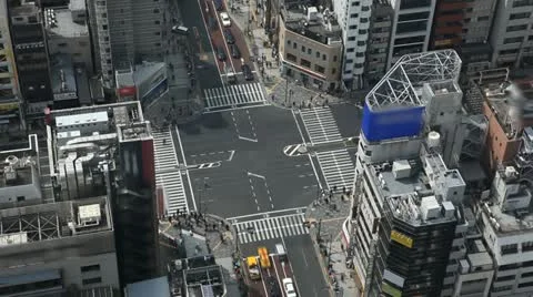 Aerial View of Tokyo Crossroad, Intersection, Commute, blurred logos, time lapse Video stock 12381796