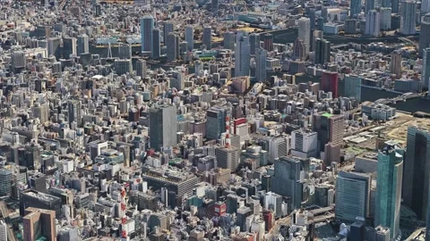 Aerial view of Tokyo Sky tree in downtown Tokyo, Japan. Circular movement a.. Stock Footage 266575655