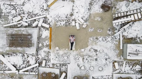 Aerial view on top builder who took a break from construction at Zik. The man Stock Footage 147318261