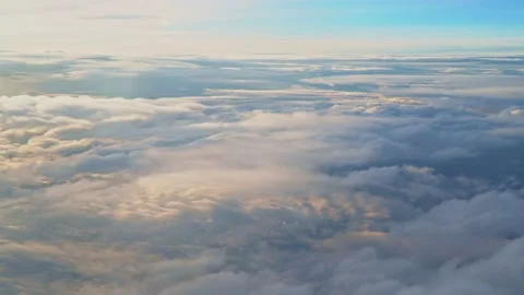 An aerial view of the top cloud from the plane window. Stock Footage 214434924