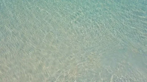 Aerial view Top-down above sea water clear. Full frame of sweater background. Stock Footage 149507001