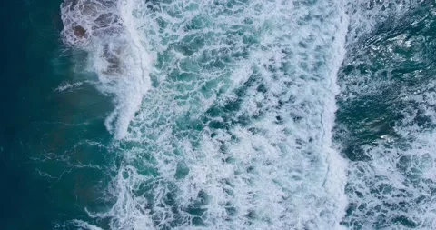Aerial view Top-down Beach sand and seawater wave in sunset time. Stock Footage 233755564