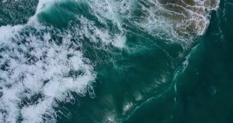 Aerial view Top-down Beach sand and seawater wave in sunset time. Stock Footage 233755723