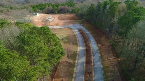 Aerial View Top Down Flying Over 2 Lane Streets In The Park Stock Footage 219030748