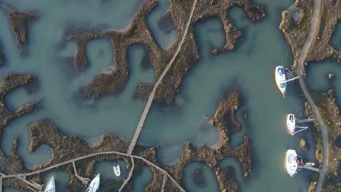 Aerial view top down overhead shot of Tollesbury Marsh at high tide Stock Footage 234512646