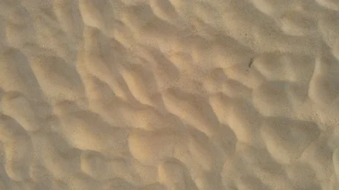 Aerial view top down view sand texture beach beautiful sunset sea twilight Stock Footage 153377266