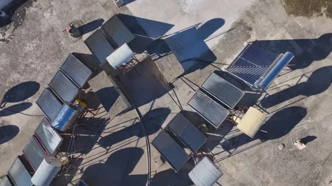 Aerial View: A top-down view of the air conditioning units on the roof of a busy Stock Footage 296094440