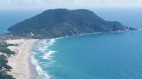 Aerial view from the top of Morro das Aranhas. Praia do Santinho, Floripa Stock Footage 104268417
