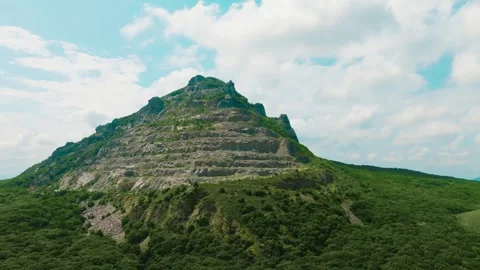 Aerial view of top of mountain with forest drone Stock Footage 253333737