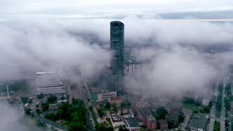 Aerial view from top on skyscraper Sky Tower in the fog in Wroclaw Stock-Footage 133901762