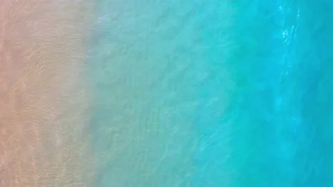Aerial view top view beach sand seawater wave on sandy beach Vídeos de archivo 146726583