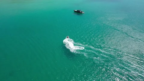 Aerial view top view beach sea ocean wave crystal boat green background Stock Footage 149503602