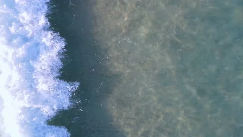 Aerial view top view beach sea sand sunny water wave crystal Phuket Thailand Stock Footage 151020213