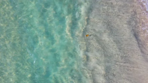 Aerial view top view beach sea sand sunny water wave beautiful Phuket Thailand Stock Footage 151020442
