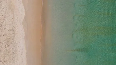 Aerial view top view beach and seawater sandy beach in summer nature and travel Stock Footage 151030048