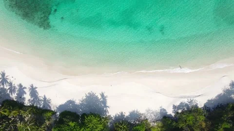 Aerial view top view beach and seawater sandy beach in summer nature and travel Stock Footage 153376854