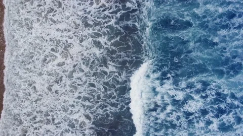 Aerial view top view beach sea sand sun crystal water wave sunny background Stock Footage 153378808