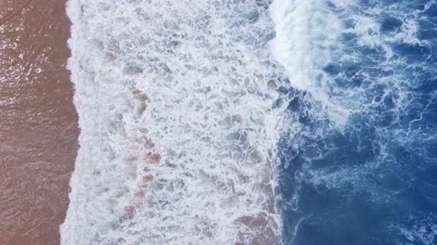 Aerial view top view beach sand crystal water wave in sea background summer Stock Footage 153378893