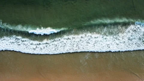 Aerial view top view beach sea sand sun crystal water wave sunny background Stock Footage 153379341