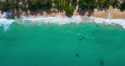 Aerial view top view beach white sand beautiful sea with waves at sunny day Stock Footage 172889415