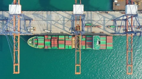 Aerial view. top view container ship in pier with crane bridge carries out expor Stock Footage 100545977