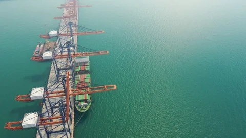 Aerial view. top view container ship in pier with crane bridge carries out expor Stock Footage 100657184