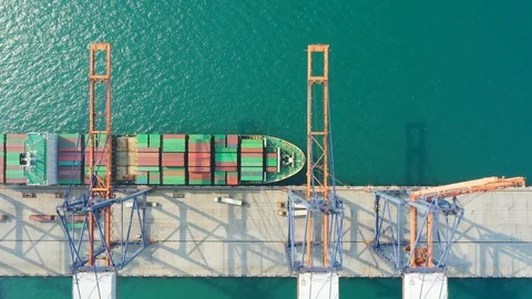 Aerial view. top view container ship in pier with crane bridge carries out expor Stock Footage 100657227