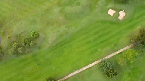 Aerial view top view golf park golf course road mixed forest green background Stock Footage 153380147