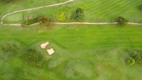Aerial view top view golf park golf course road mixed forest green background Stock Footage 153380174