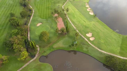 Aerial view top view golf park golf course road mixed forest lake background Stock Footage 153380194