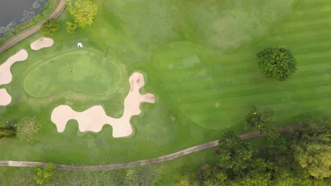 Aerial view top view golf park road mixed forest lake view green background Stock Footage 153380319