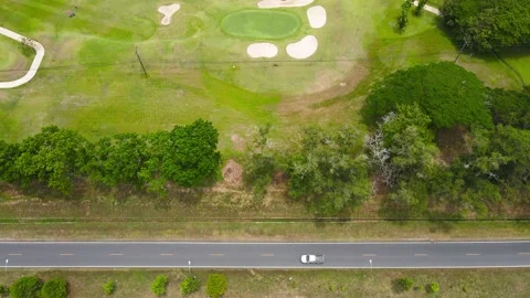 Aerial view top view Golf park nature tree golf course road green background Stock Footage 172390953