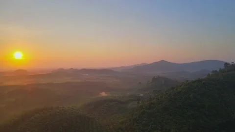 Aerial view top view sunset mountain mixed forest colors cloud background Stock Footage 151064526