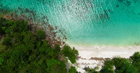 Aerial view Top view of waves break on tropical white sand beach Stock Footage 119970486