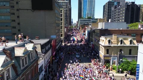 Aerial View of Toronto Pride Parade Crowds Filling Church Street Downtown 202 Video stock 337912630