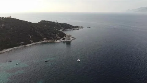 Aerial view Tour de la Mortella Tower and lighthouse, Cap Corse, Corsica, F.. Stock Footage 320264148