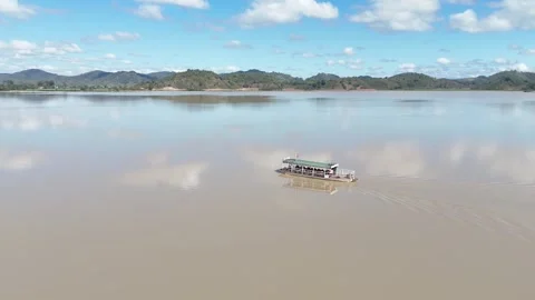 Aerial View of Tourist Boat Cruising on Calm Lak Lake 스톡 동영상 344088731