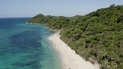 Aerial View of Tourists on Puka Shell Beach with Lush Green Hills, Boracay, Phil Stock Footage 340310597