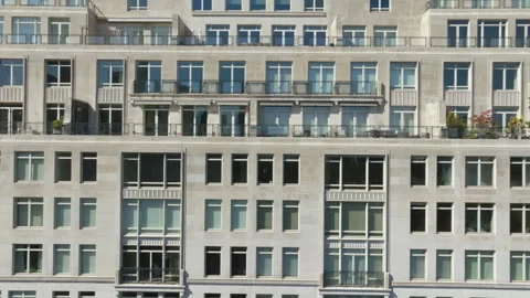 Aerial view toward windows and balcony on the 15 Central park west  in Vídeos de archivo 254166045