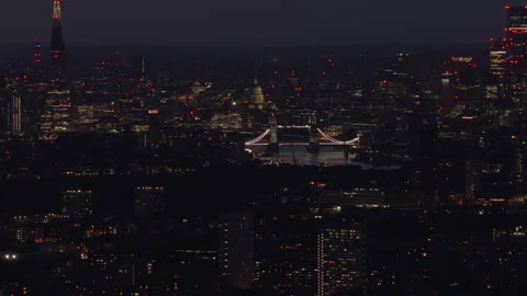 Aerial View of Tower Bridge and London Skyline at Night Stock Footage 340840525