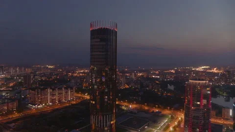 Aerial view of the tower in the city centre against the backdrop of night lights Stock Footage 135712813